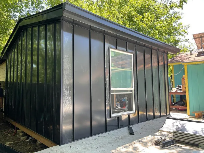 Black standing seam metal wall panels for Roof Inspection in Gulf Park Estates